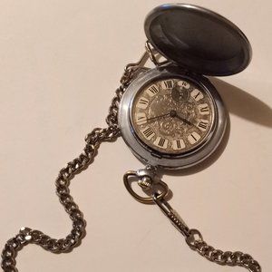 Vintage pocket watch Molnija wind-up running Russian